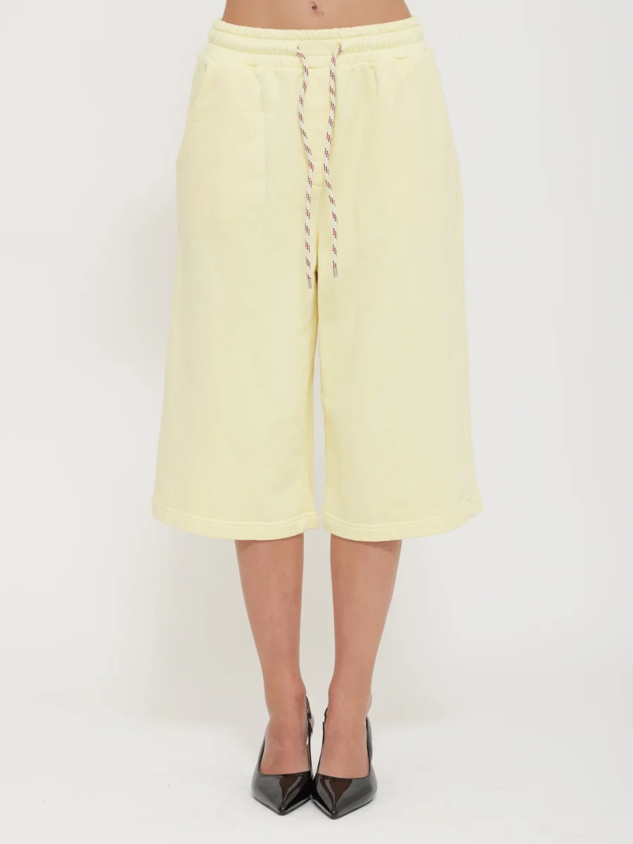 Tuta bermuda con laccio regolabile