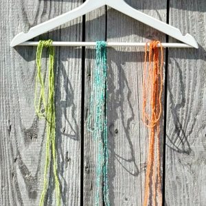 COLLANA LUNGA A FILO SINGOLO DI PERLINE