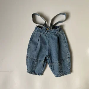 Pantaloni con bretelle in denim