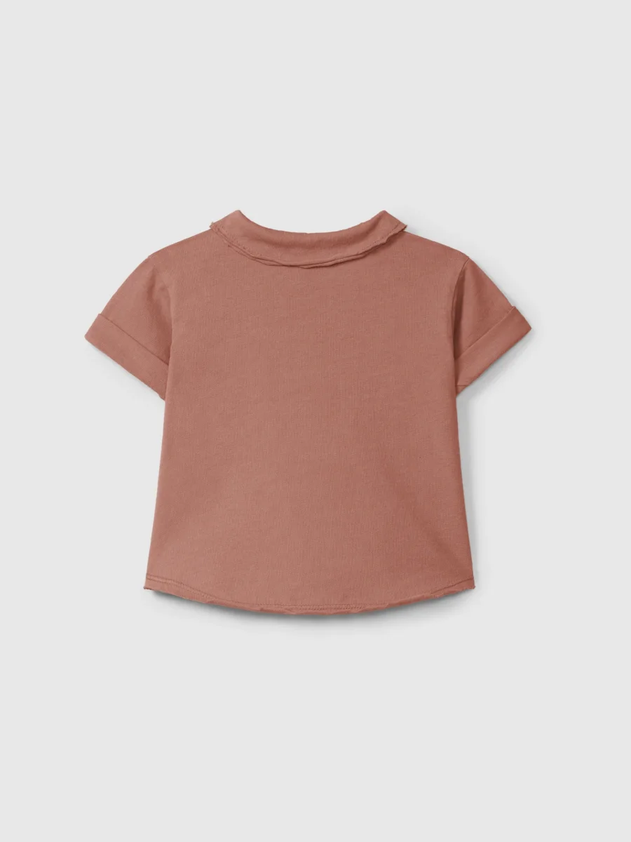 Polo in jersey tinta unita con taschino - immagine 3